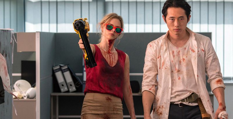 Samara Weaving and Steven Yuen in Mayhem