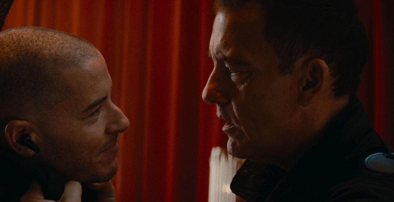 Taz Skylar and Clive Owen in Cleaner (2025)