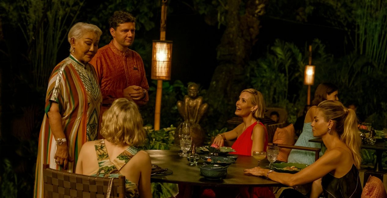 Leslie Bibb, Carrie Coon, and Michelle Monaghan in The White Lotus Season 3 Episode 1